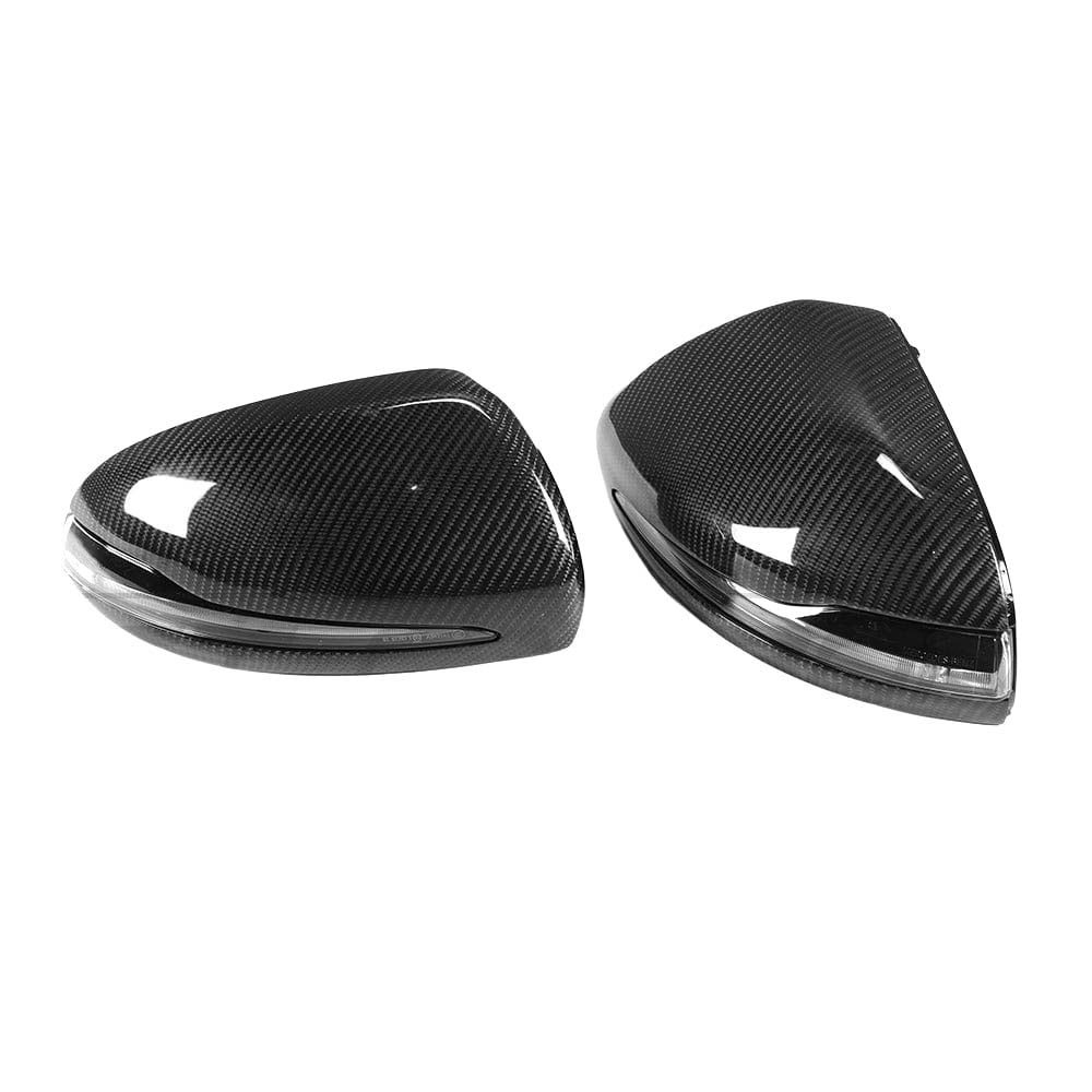 Carbon fibre side mirror replacements for Mercedes W205 and W213, LHD only, by CT Carbon, showing sleek mirror caps on vehicle.