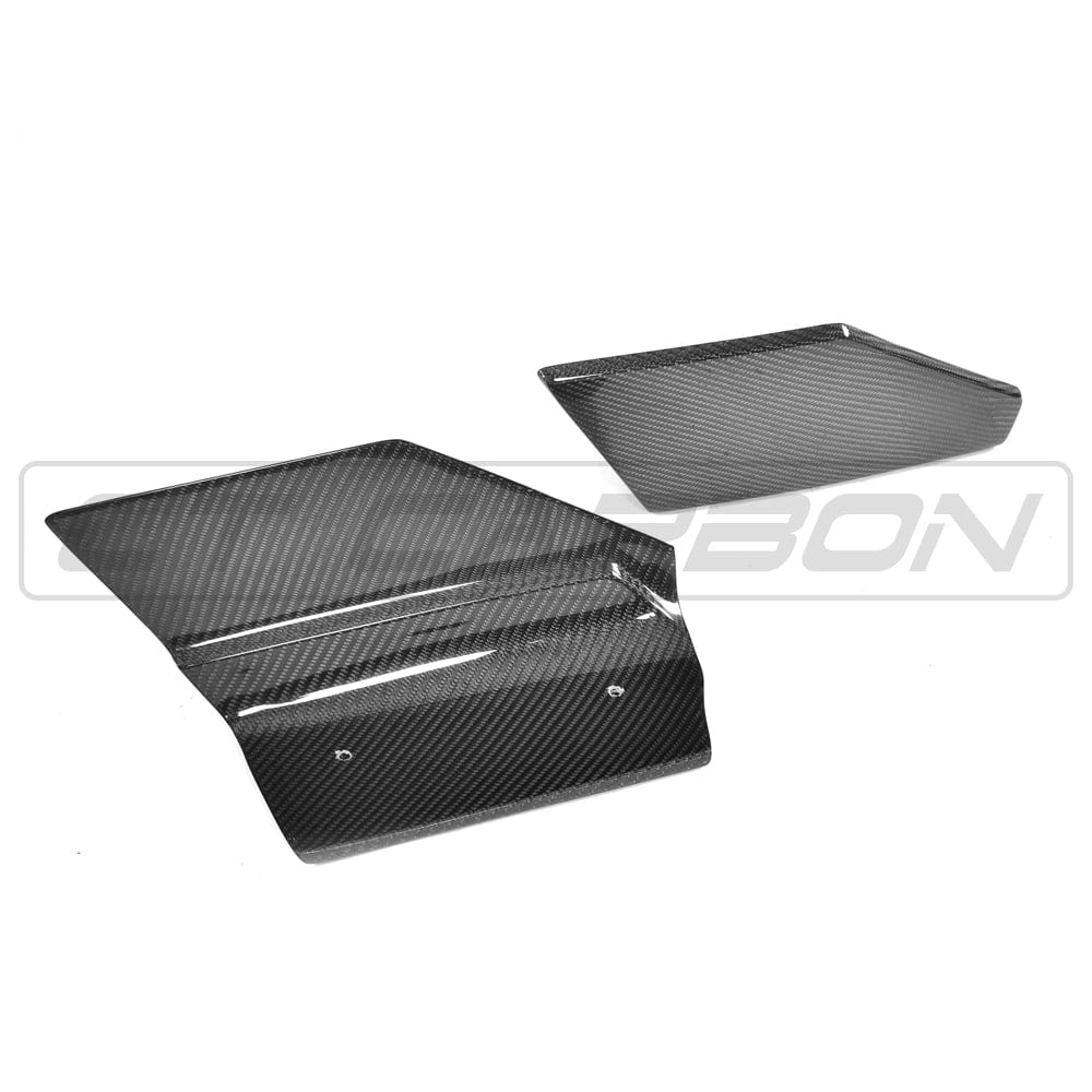 BMW F16 X6 carbon fibre rear bumper extensions from CT Carbon, showcasing sleek, lightweight accessory enhancements.