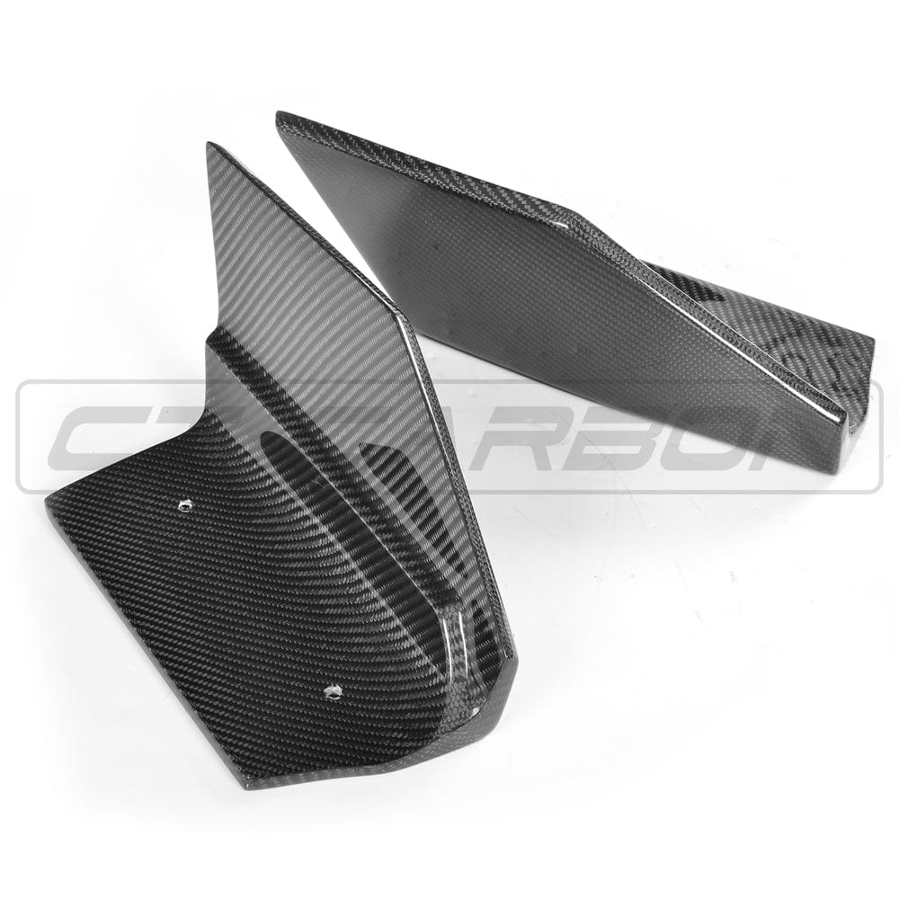 BMW F16 X6 carbon fibre rear bumper extensions by CT Carbon, showcasing sleek aerodynamic accessories for enhanced vehicle style.