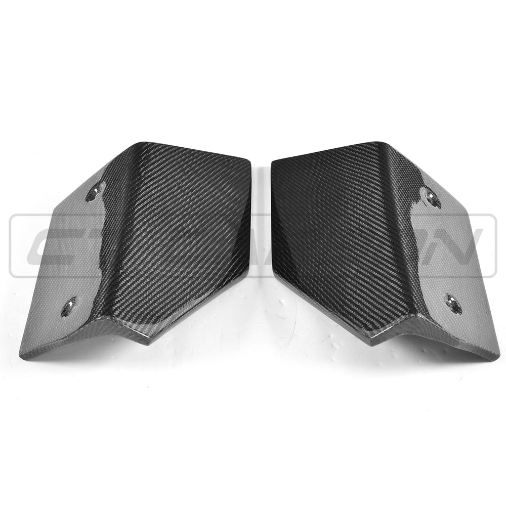 BMW F16 X6 carbon fibre rear bumper extensions by CT Carbon, showcasing sleek, lightweight accessories for enhanced rear styling.