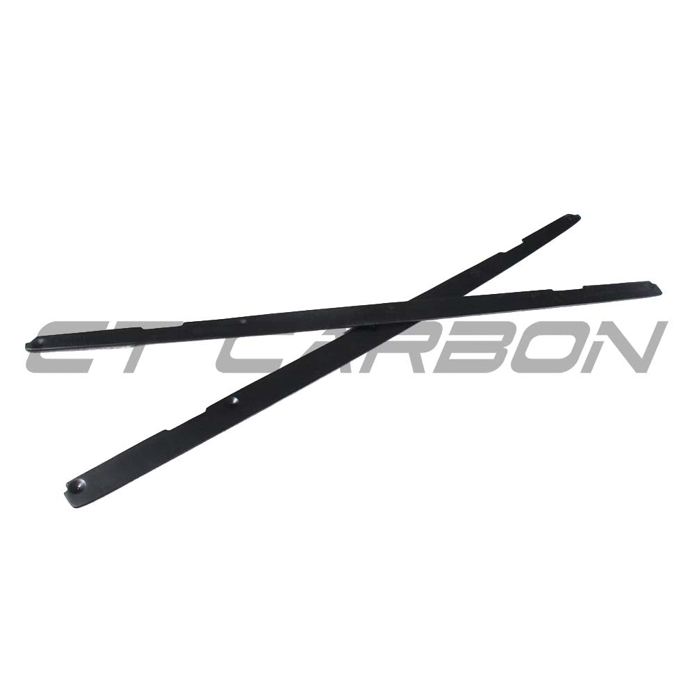 BMW 1 & 2 Series F20/F22/F23 carbon fibre side skirts by CT Carbon, featuring sleek MP style design on a vehicle.