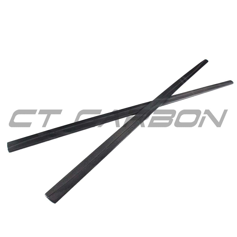 BMW F32 F33 4 Series carbon fibre side skirts by CT Carbon, shown installed on the car with a sleek MP style design.