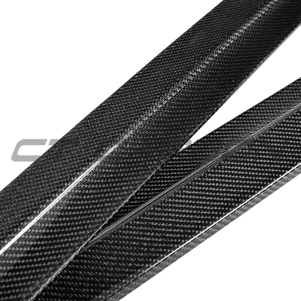 BMW G30 5 Series carbon fiber side skirts kit by CT Carbon, featuring sleek MP style design on a black exterior.