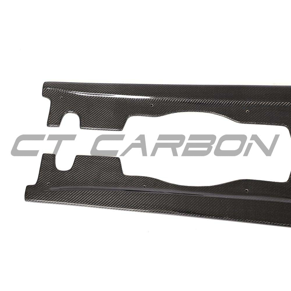 BMW M3 E92 carbon fibre side skirts by CT Carbon, showcasing sleek, lightweight design and precise fit on the side of the car.