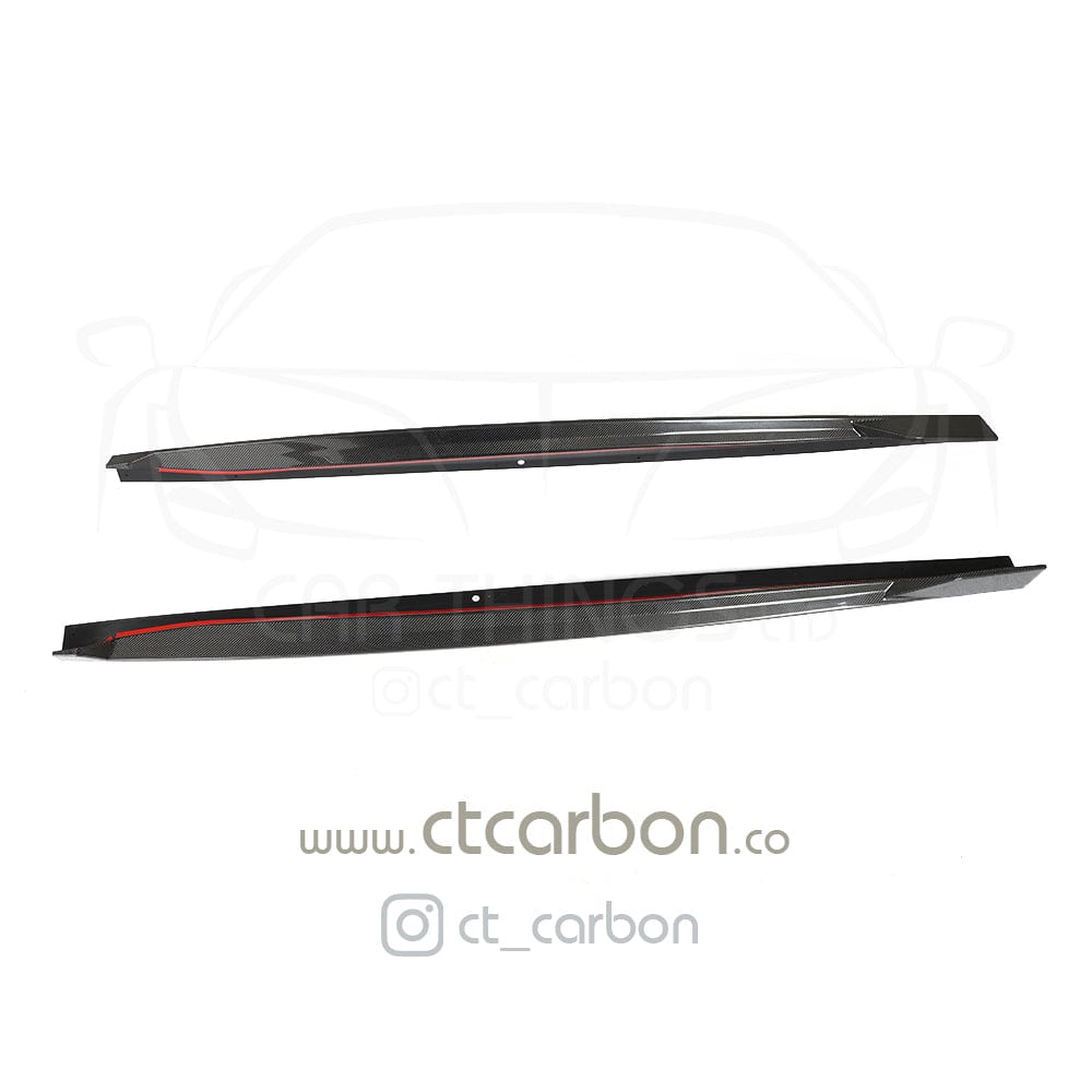 BMW X5 G05 carbon fibre side skirts by CT Carbon, showing sleek, textured side skirt design for sporty vehicle enhancement