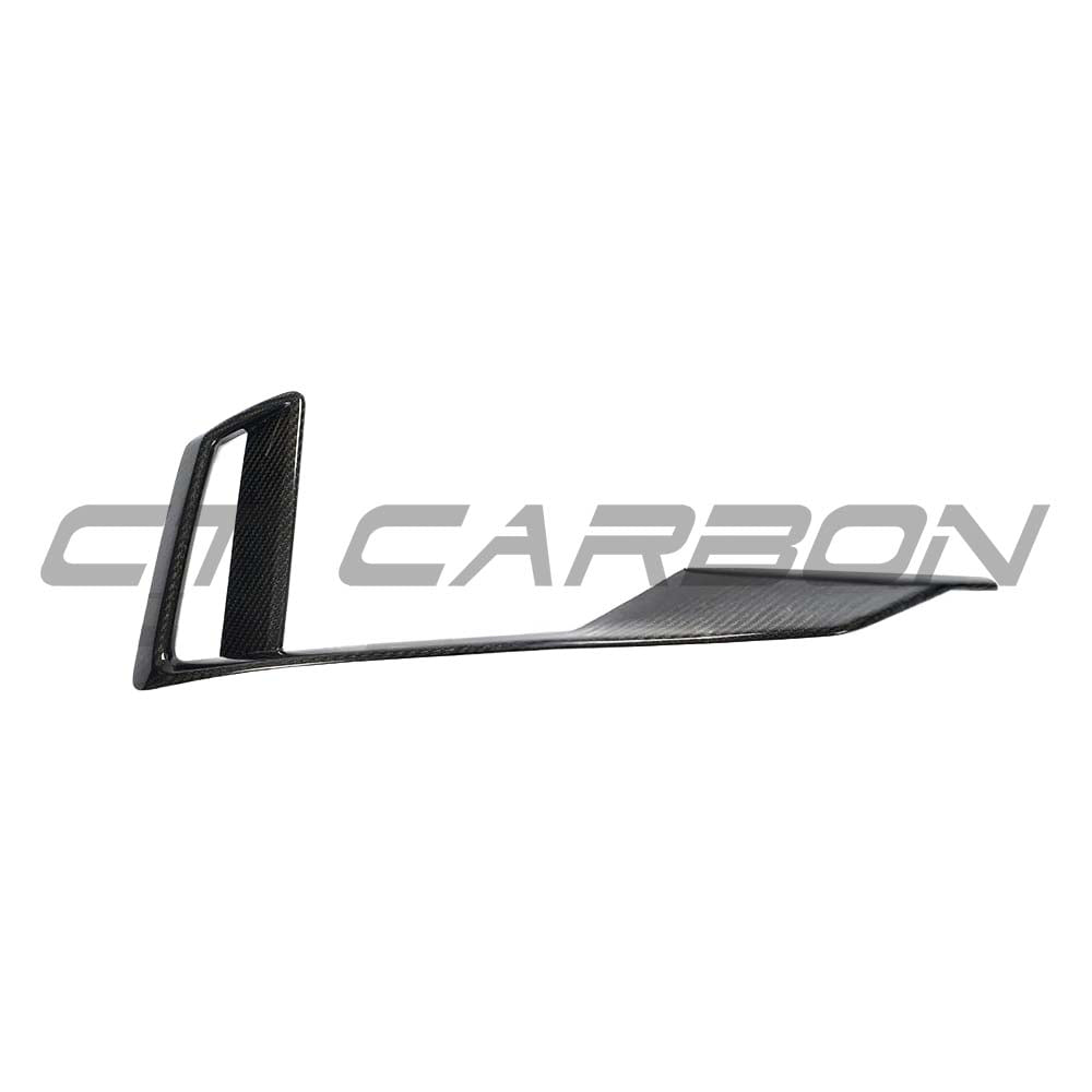 Carbon fibre bumper trim for Audi RS3 8V facelift by CT Carbon, showcasing sleek, V-style carbon fibre accessory on the front bumper.
