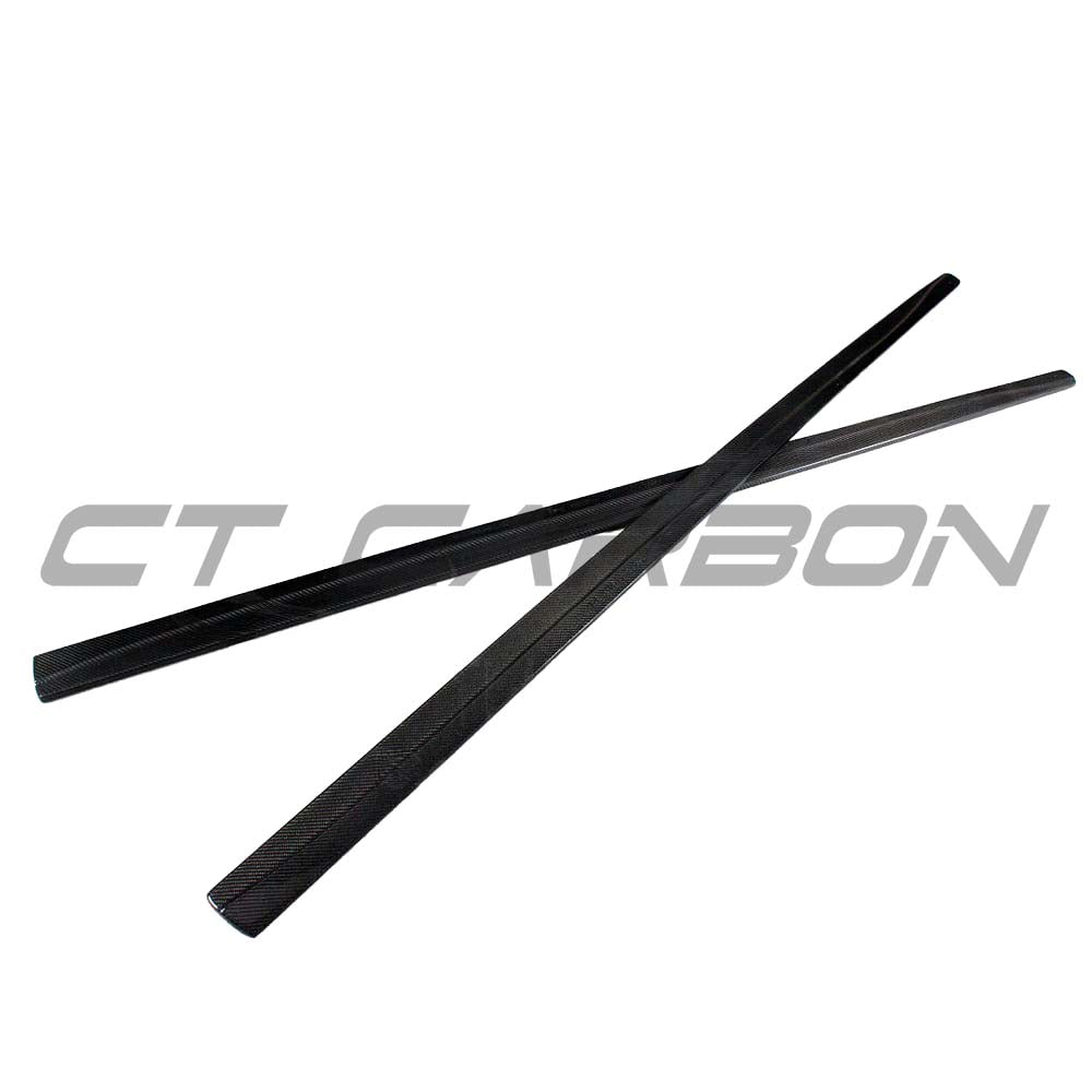 BMW F32 4 Series Coupe full carbon fibre kit with splitters and twin exhaust, showcasing sleek carbon fiber details.