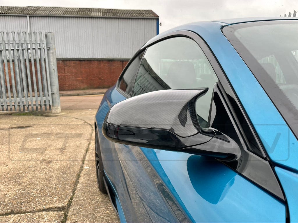 BMW F80/F82/F83/F87 M2C M3 M4 carbon fiber mirrors by CT Carbon, LHD only, featuring sleek, lightweight design.