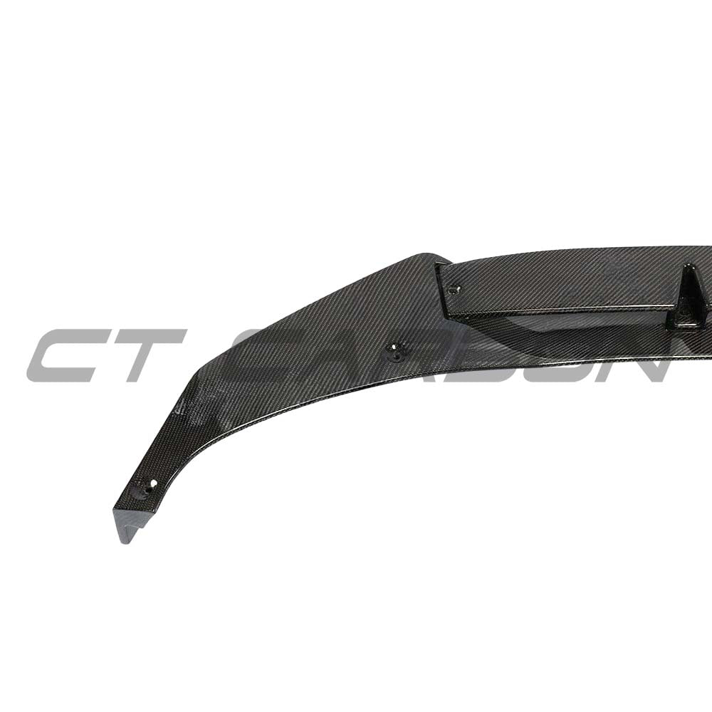 BMW G05 X5 full carbon fibre kit by CT Carbon, showing the high-quality splitters and aerodynamic components on the vehicle.