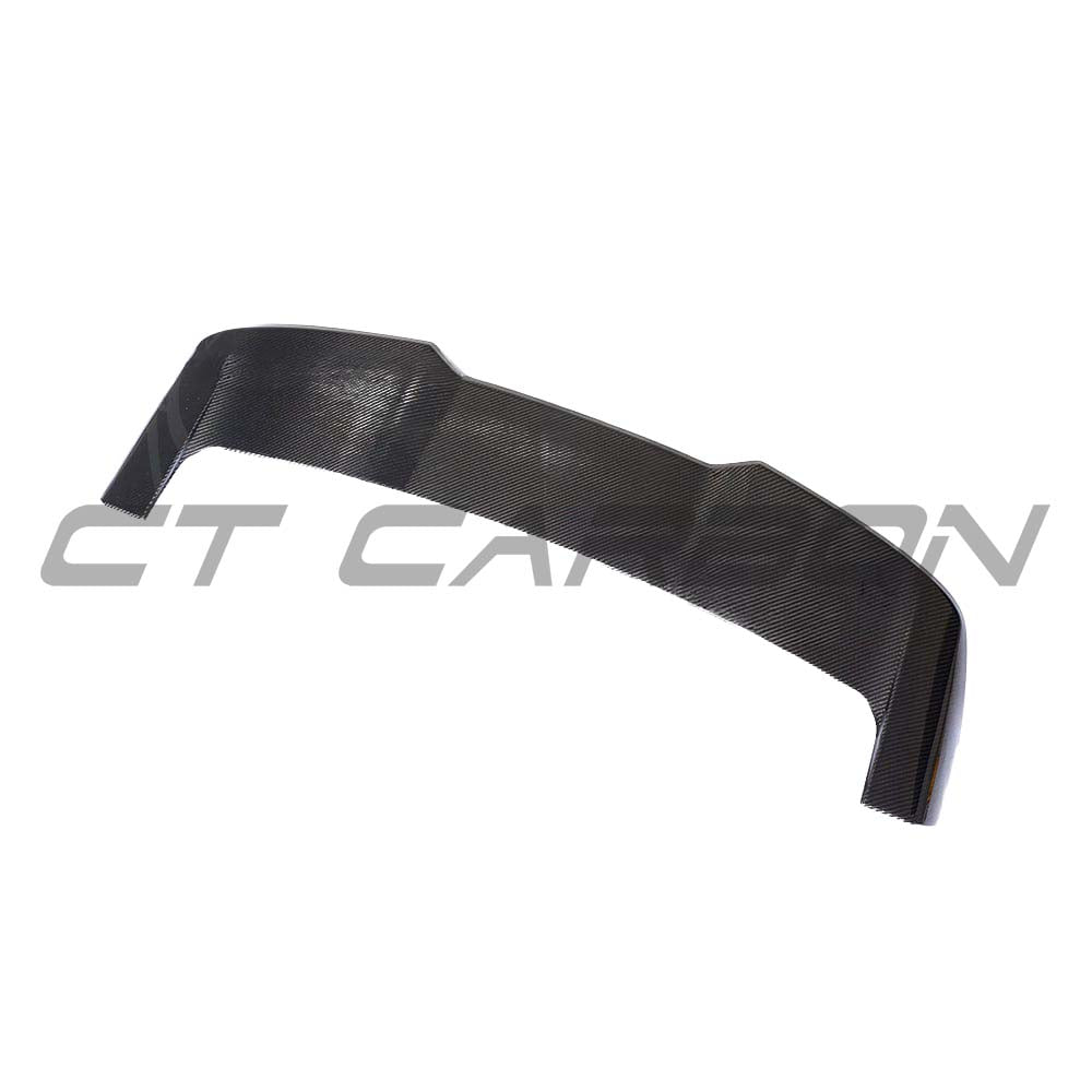 BMW G05 X5 full carbon fiber kit by CT Carbon, including splitter and body accessories, showcasing sleek, lightweight carbon fiber parts.