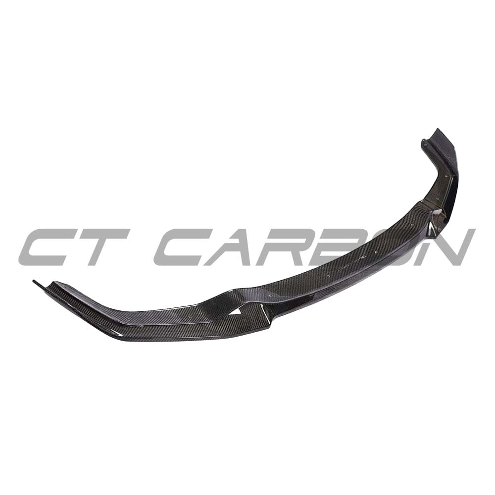 BMW M2 F87 carbon fibre splitter by CT Carbon, showcasing sleek V6-style aerodynamic front splitter in close-up view.
