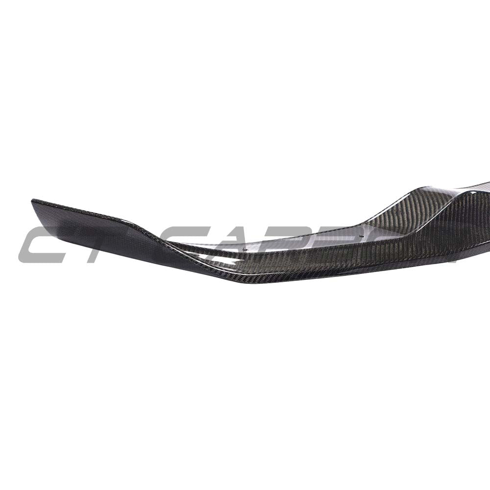 BMW F87 M2 2016-2018 CT Carbon full carbon fibre splitter kit on the front of the car, showcasing sleek, lightweight carbon fiber design.