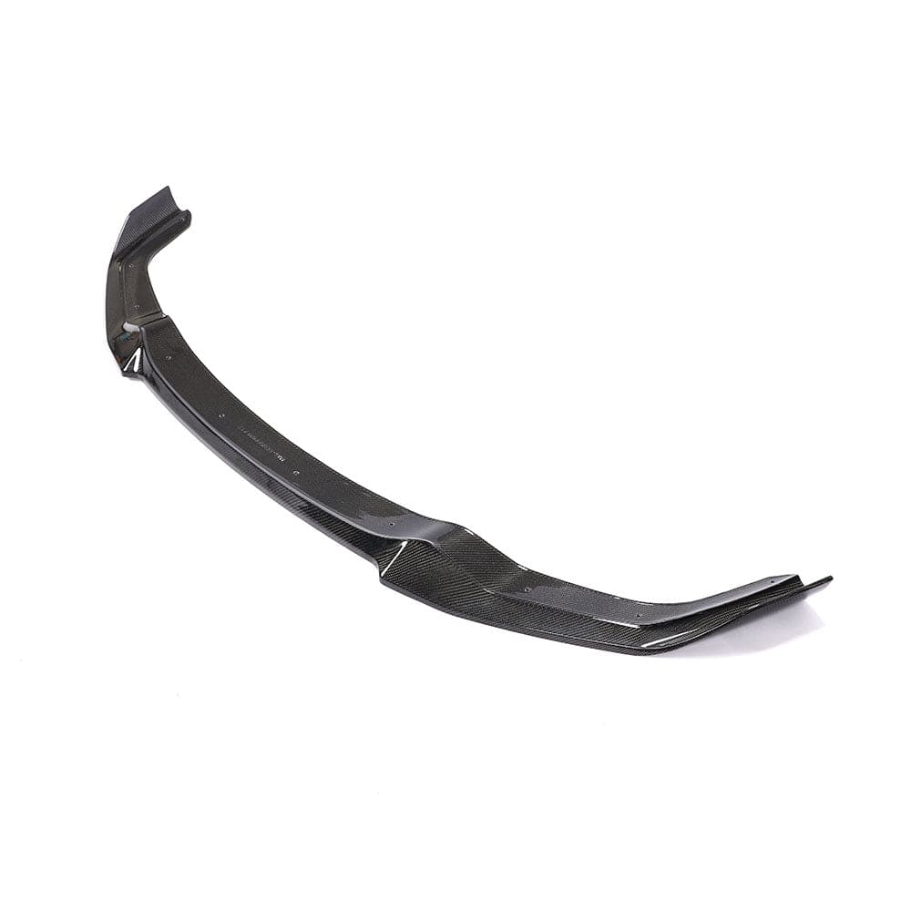 BMW M2 F87 carbon fibre splitter by CT Carbon, V6 style, showcasing the sleek, aerodynamic design and textured carbon fiber surface.
