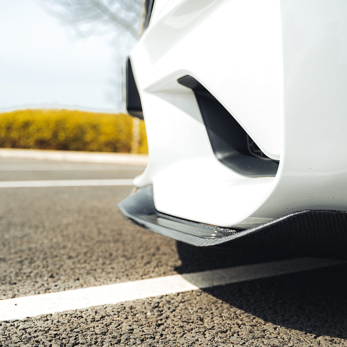 BMW M2 F87 CT Carbon V6 carbon fibre splitter, aerodynamic front splitter for sporty performance and sleek design.