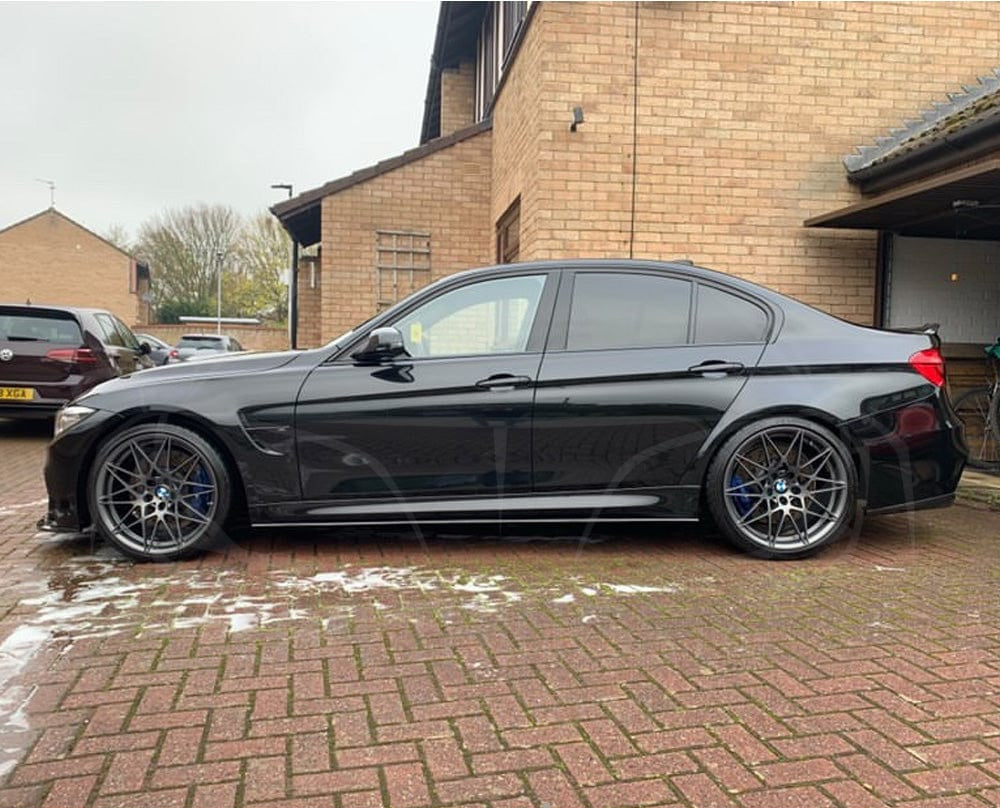 BMW M3 F80 saloon with CT Carbon full carbon fibre V-style kit, including splitter and body panels, showcasing a sleek carbon finish.