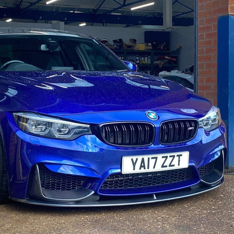 BMW M3 F80 full carbon fibre kit by CT Carbon, featuring splitter and body panels in glossy carbon fibre for sporty look.