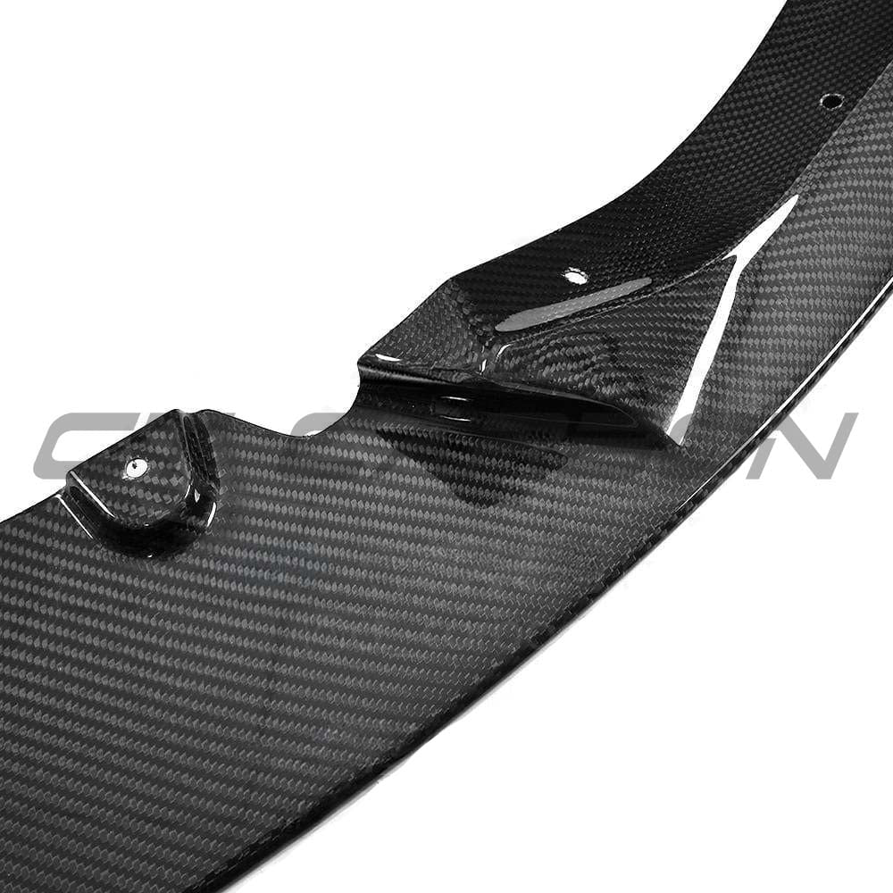 BMW M3 M4 F80 F82 F83 carbon fibre splitter by CT Carbon, showcasing a 3D-style front splitter with detailed carbon fiber finish.