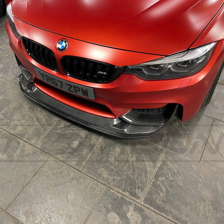 BMW M3 M4 F80 F82 F83 carbon fibre splitter by CT Carbon, GTS style, two-piece design, enhances sporty front end appearance.