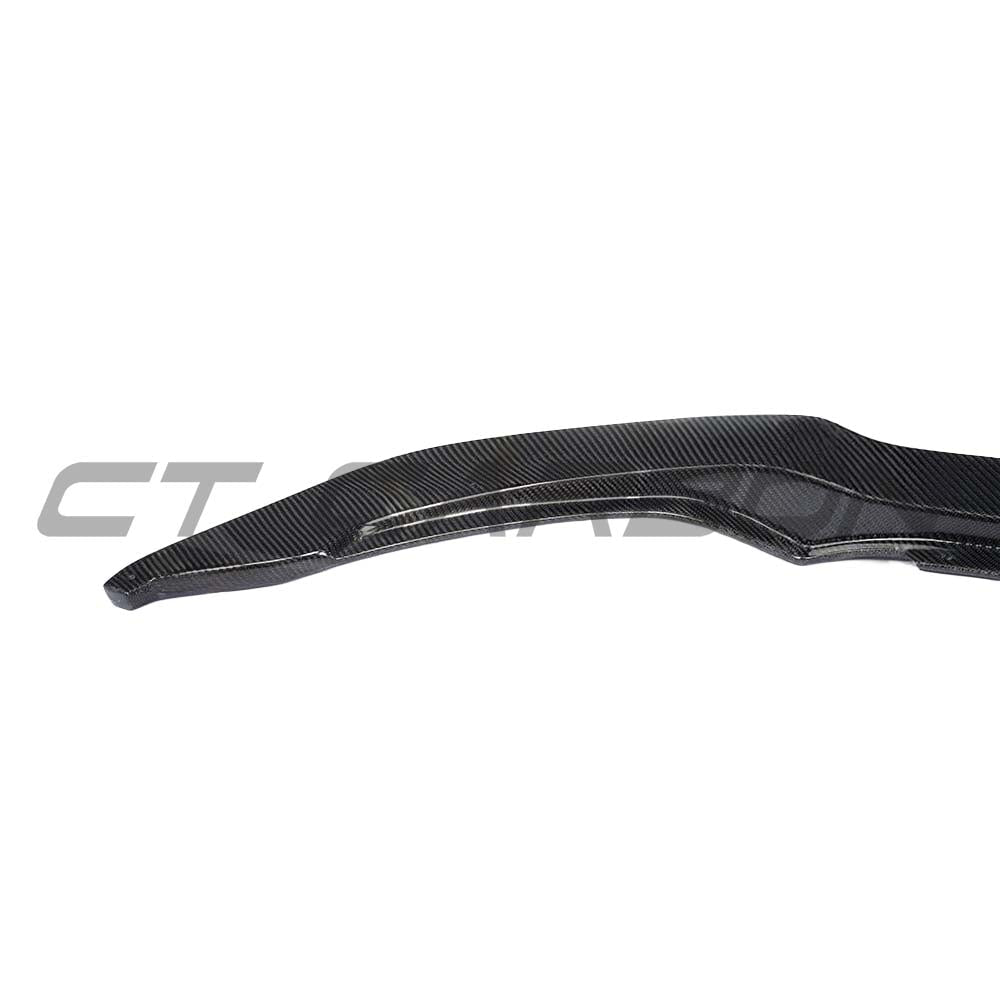 BMW M3 F80 saloon with CT Carbon V3 full carbon fibre splitter kit, showcasing sleek V-style front splitter and aggressive design.