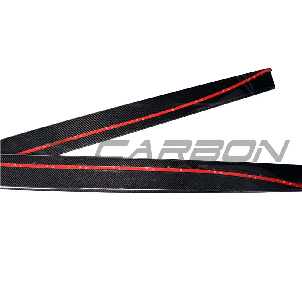 BMW F82 M4 coupe full carbon fibre kit by CT Carbon, including splitter and V-style accents, shown on the car's front and side.