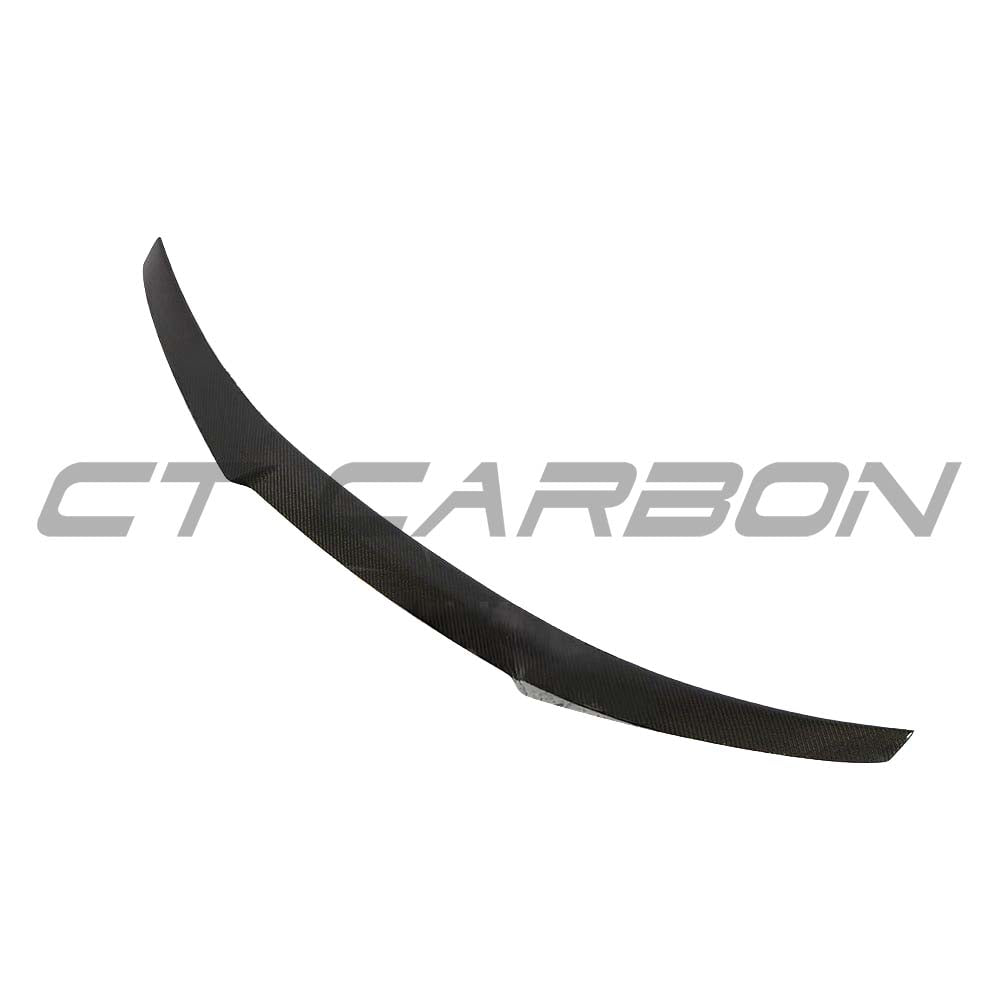 BMW F82 M4 Coupe 2014-2020 CT Carbon full carbon fibre kit V-style splitter and body parts on the car's front and side view.