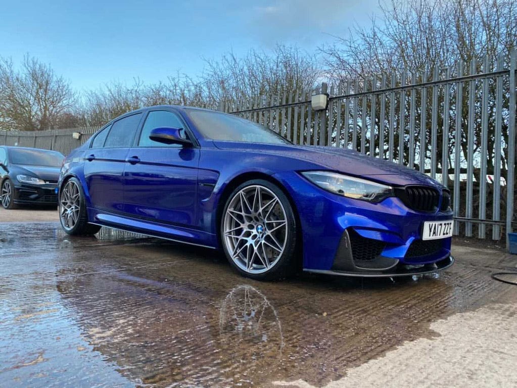 BMW M4 F83 convertible full carbon fibre kit by CT Carbon, featuring splitters and aerodynamic components on the car.
