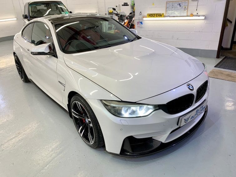 BMW M4 F83 convertible with CT Carbon full carbon fibre kit, showing splitter and aerodynamic enhancements on the car.