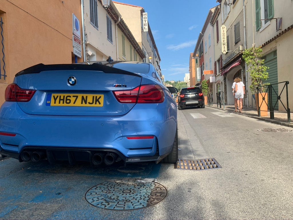 Full view of a BMW M4 F83 convertible with CT Carbon full carbon fibre kit, including splitter and aerodynamic body components.