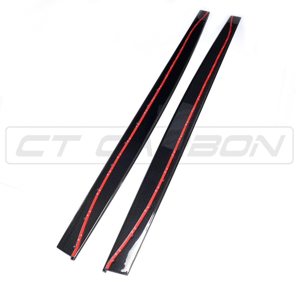BMW M4 F83 convertible with CT Carbon full carbon fiber kit, including splitter and aerodynamic components, showcasing sleek carbon fiber finish.