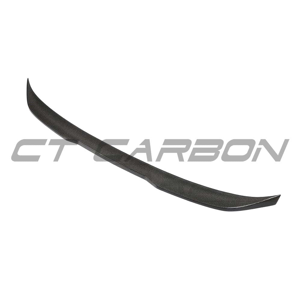 BMW M5 F90 and G30 5 Series carbon fibre spoiler by CT Carbon, showcasing sleek, aerodynamic design on the vehicle.