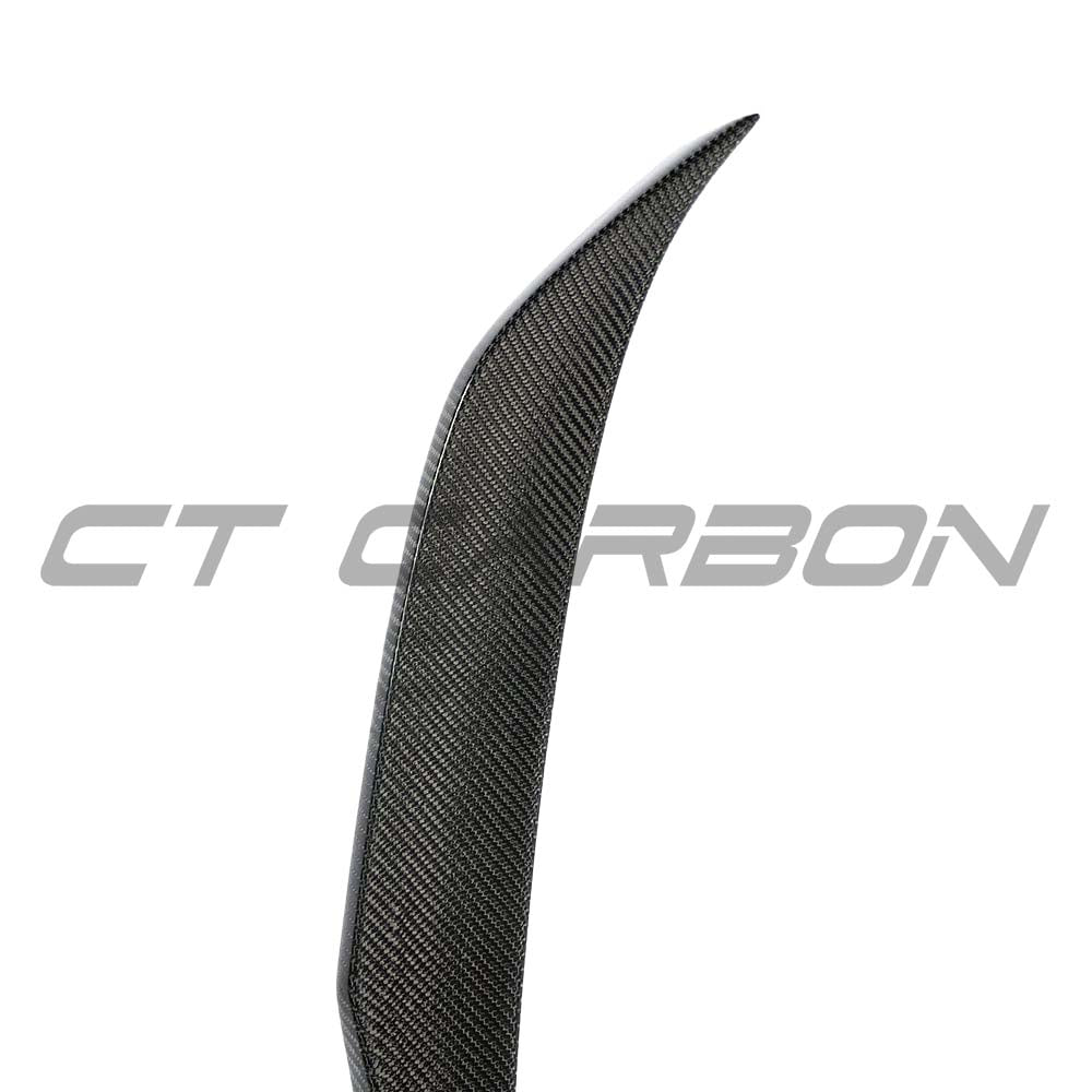 BMW M5 F90 and G30 5 Series carbon fibre spoiler by CT Carbon, showcasing sleek, aerodynamic design and high-quality material.