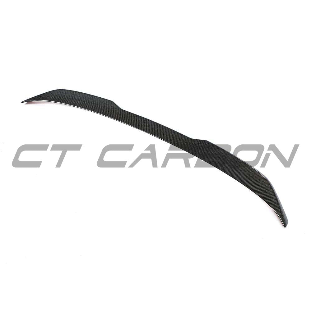 BMW M5 F90 and G30 5 Series carbon fibre spoiler by CT Carbon, showing the sleek, lightweight design on the car's rear.