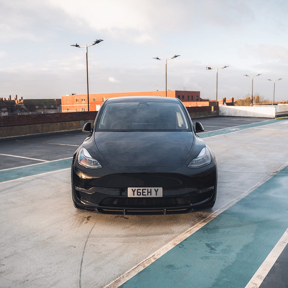 Tesla Model Y MK1 2020-2025 carbon fibre splitter by CT Carbon, showing the sleek, lightweight automotive front splitter.
