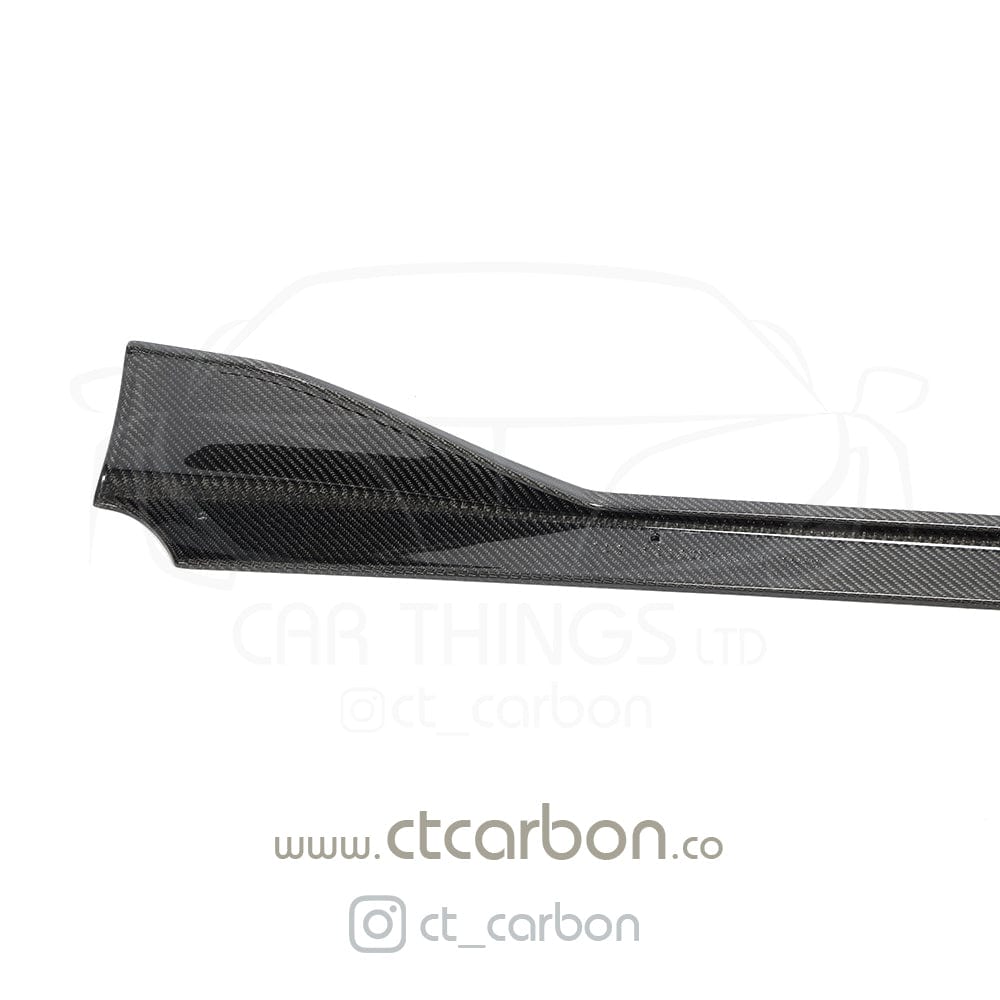Full view of a Toyota Supra 2019+ A90 with CT Carbon full carbon fiber kit, showcasing the splitter and aerodynamic enhancements.