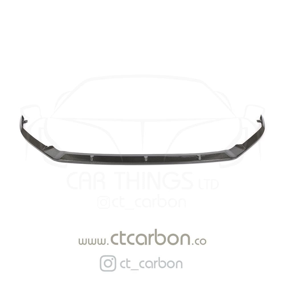 Carbon fiber splitter for VW Golf R MK7.5 by CT Carbon, showing the sleek, aerodynamic design of the car accessory.