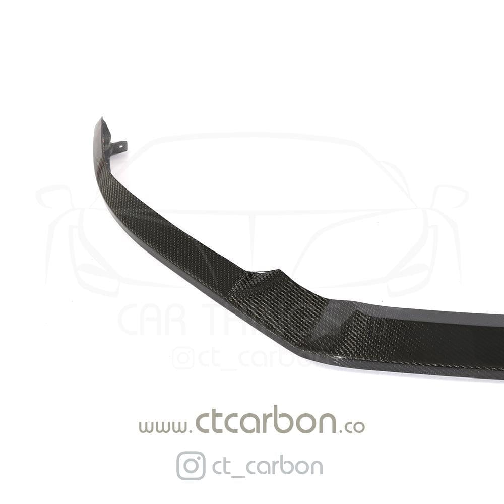Carbon fibre splitter for VW Golf R MK7.5, designed by CT Carbon, attached to the front bumper for enhanced aerodynamics.