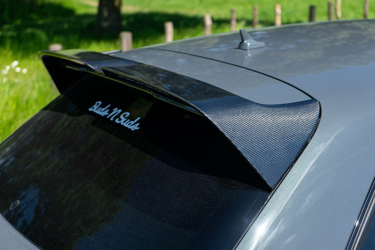 CT Carbon Audi A3 S-Line & S3 Sportback 8V carbon fibre spoiler showing sleek aerodynamic design on hatchback model.