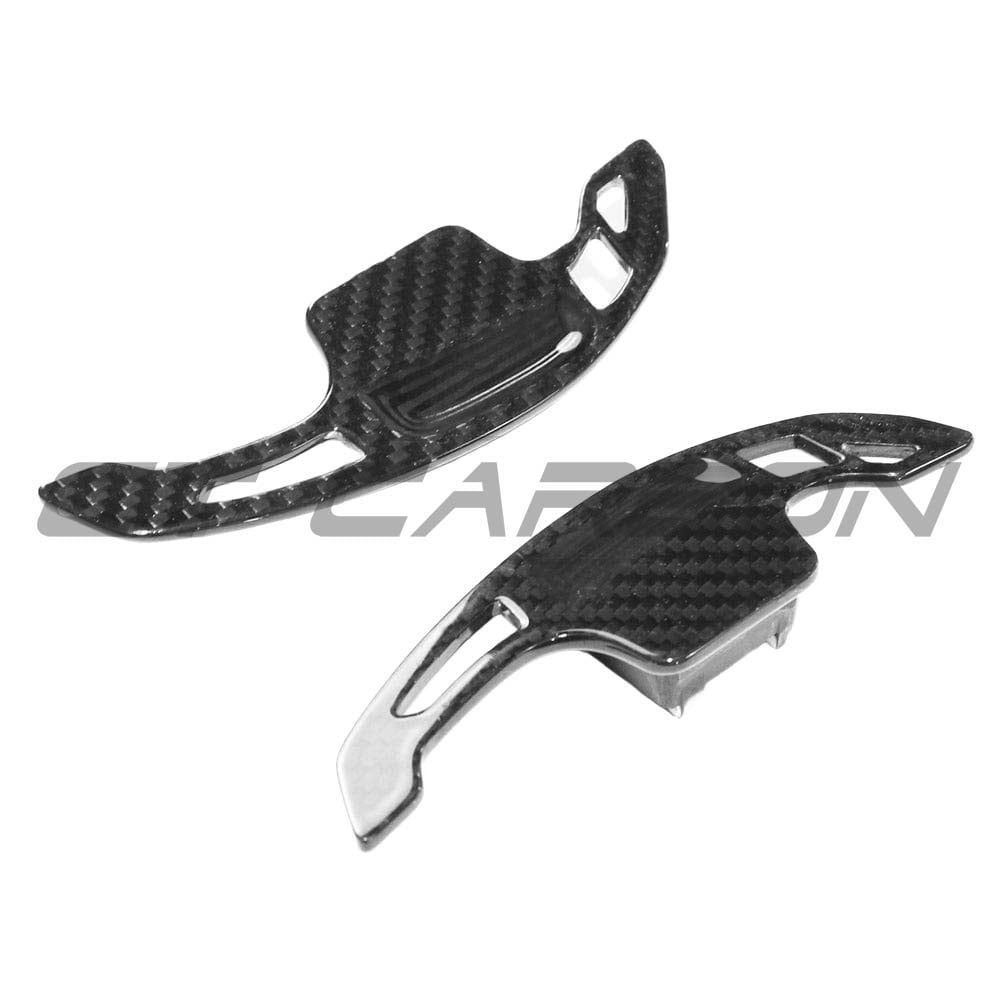 Carbon fiber shifter paddles for Audi A3, S3, and RS3 8V models by CT Carbon, shown as sleek, textured accessories.