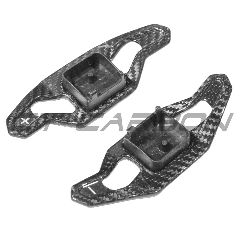Carbon fiber shifter paddles for Audi A3, S3, RS3 8Y, RS6 C8 by CT Carbon, showing sleek, textured carbon fiber surface.