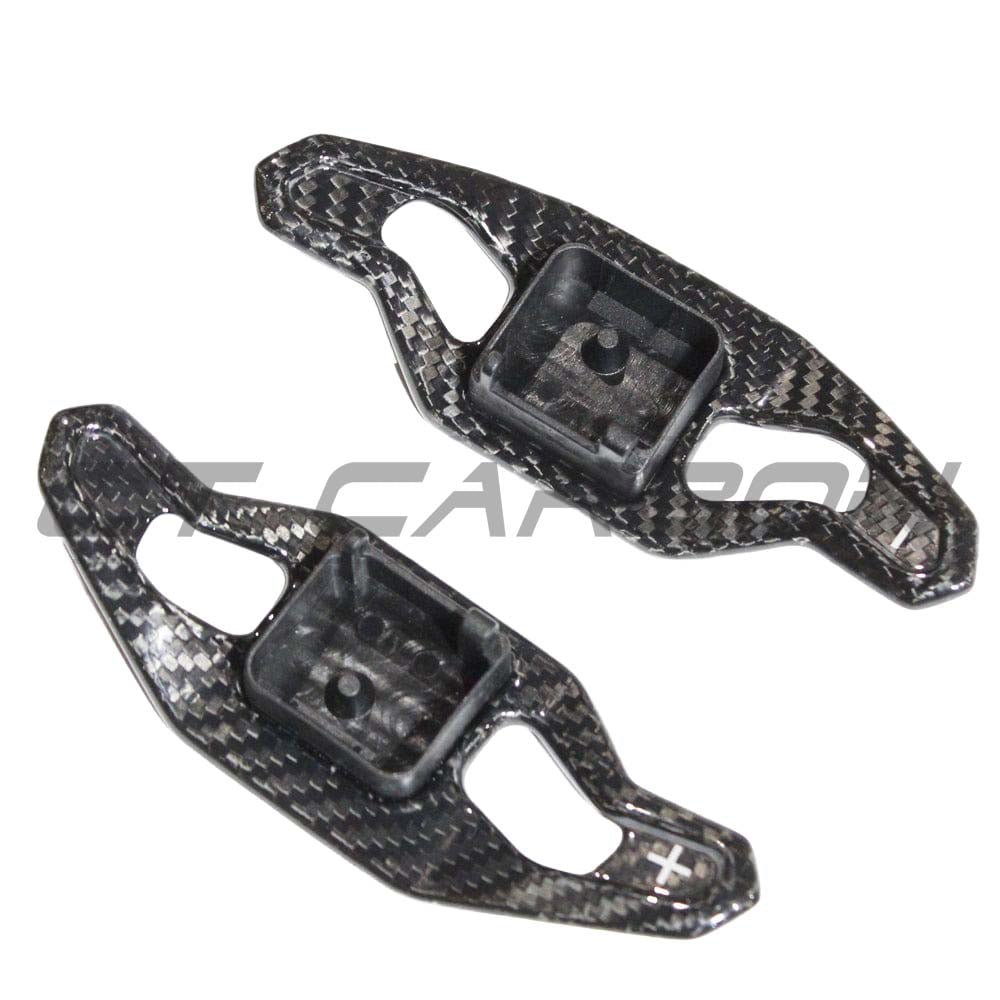 Carbon fiber shifter paddles for Audi A3 S3 RS3 8Y RS6 C8 by CT Carbon, showing sleek, textured paddle design for sporty interior upgrade.