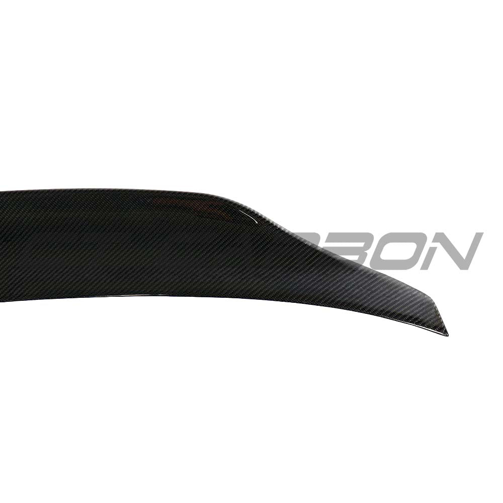 BMW F32 4 Series Carbon Fibre Spoiler by CT Carbon, showcasing sleek, aerodynamic design on a sporty car.