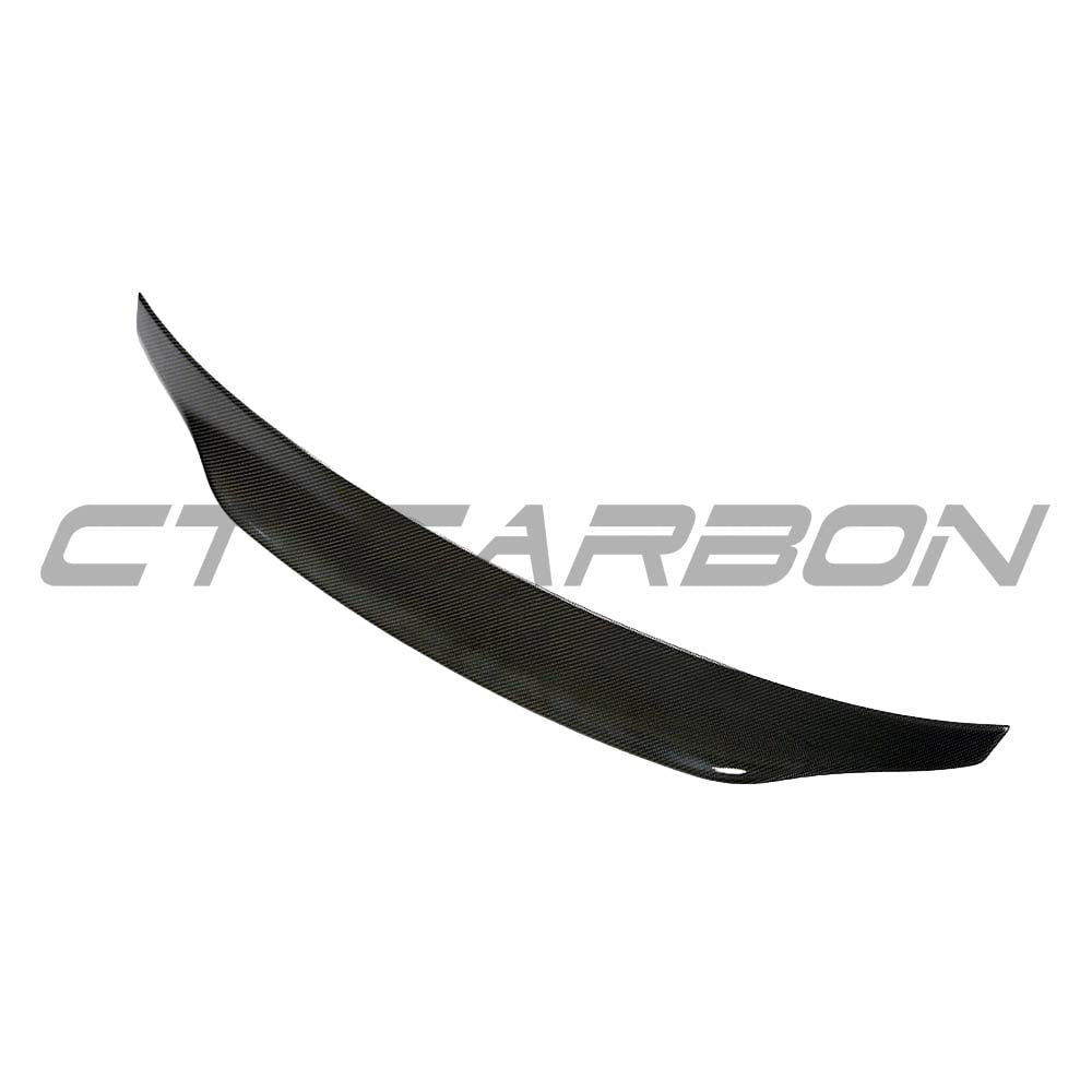 BMW F32 4 Series carbon fibre spoiler by CT Carbon, V2 style, mounted on the car's rear for sporty aerodynamic enhancement.