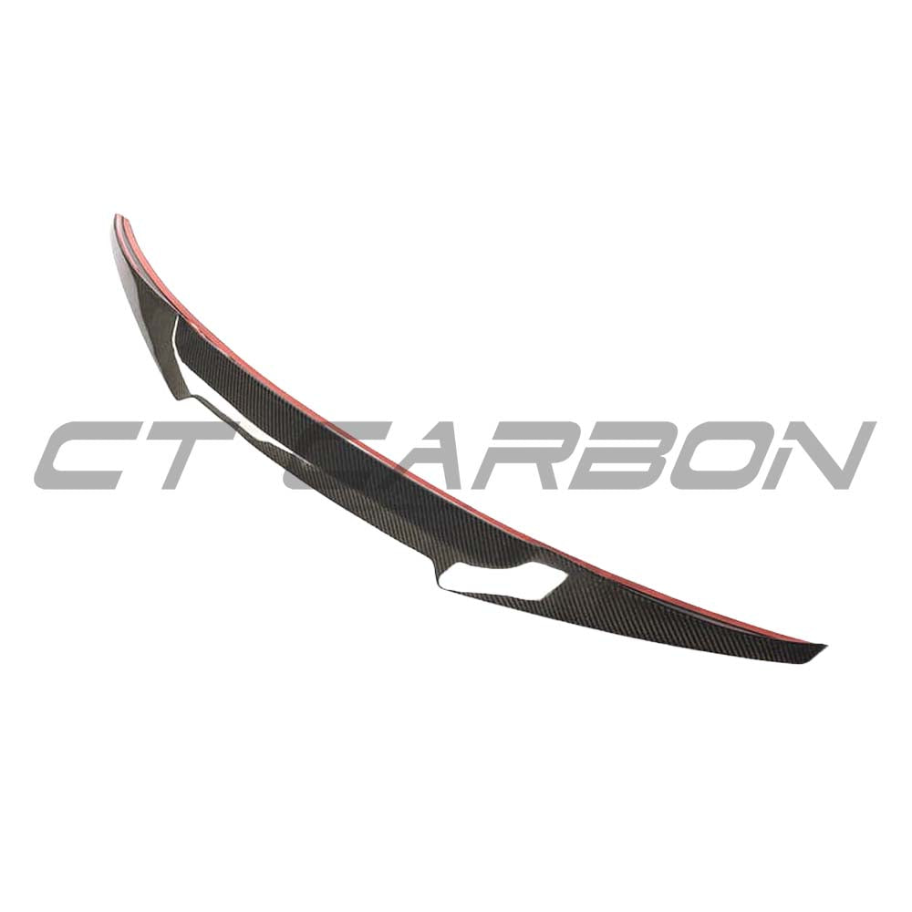 BMW F36 4 Series Gran Coupe carbon fiber spoiler by CT Carbon, M4-style, showcased on the vehicle's rear with a sleek finish.