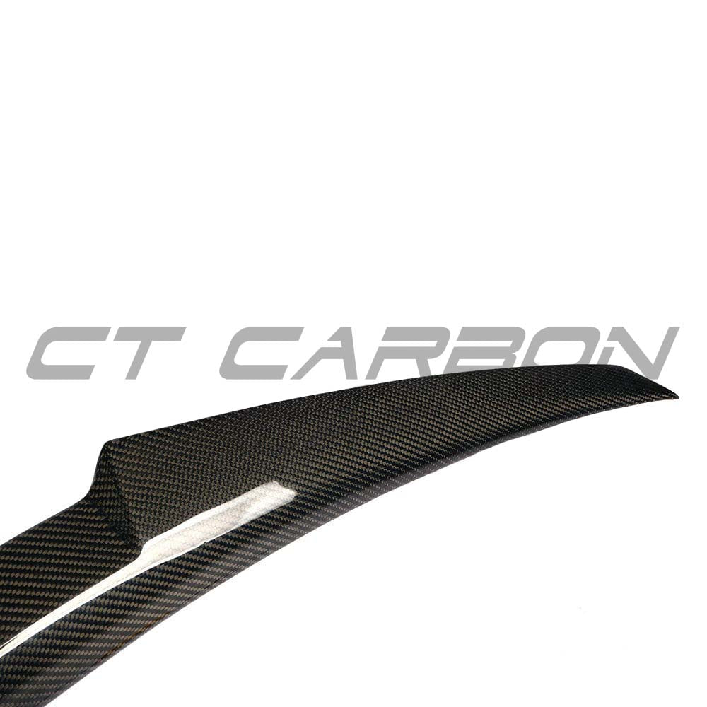 BMW F36 4 Series Gran Coupe CT Carbon carbon fibre spoiler in M4 style, mounted on the car's rear for sporty aerodynamics.