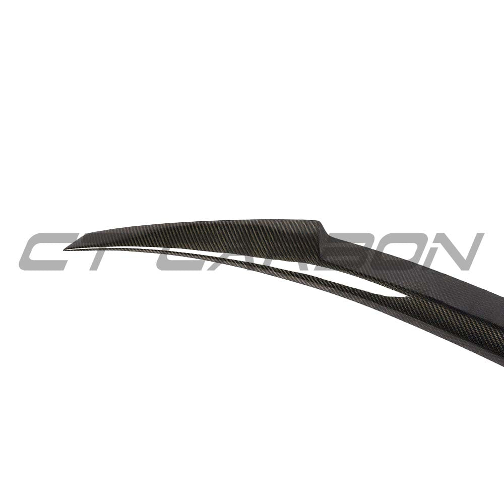 BMW F36 4 Series Gran Coupe carbon fiber spoiler by CT Carbon, M4 style, shown mounted on the coupe with a sleek glossy finish.