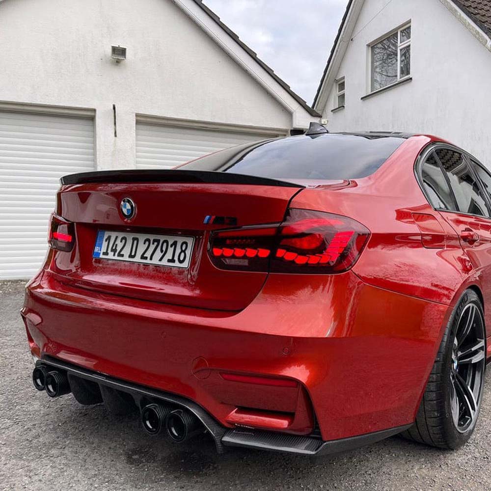 BMW M3 F80 and F30 CT Carbon carbon fibre spoiler with V4 design, rear boot style, on a clean white background.