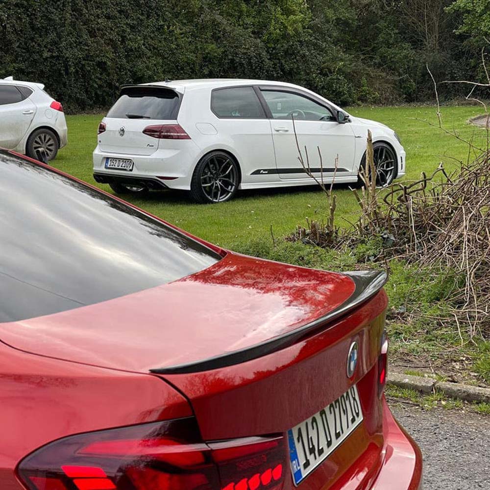 BMW M3 F80 and F30 carbon fibre spoiler by CT Carbon, rear boot spoiler with sleek MP-style design, enhances sporty look.