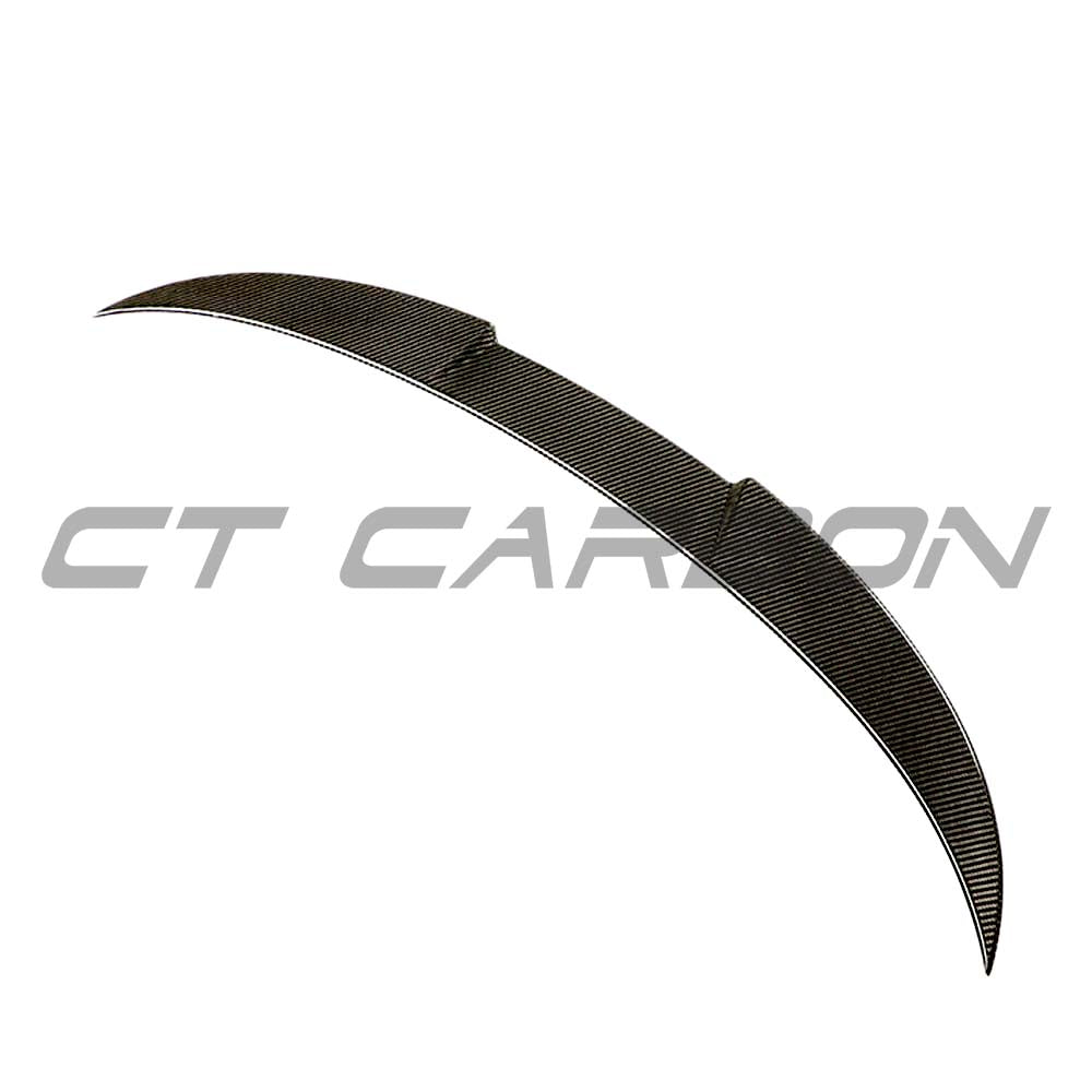 BMW M4 G83 G23 carbon fibre spoiler by CT Carbon, showcasing sleek aerodynamic design on a sporty vehicle.