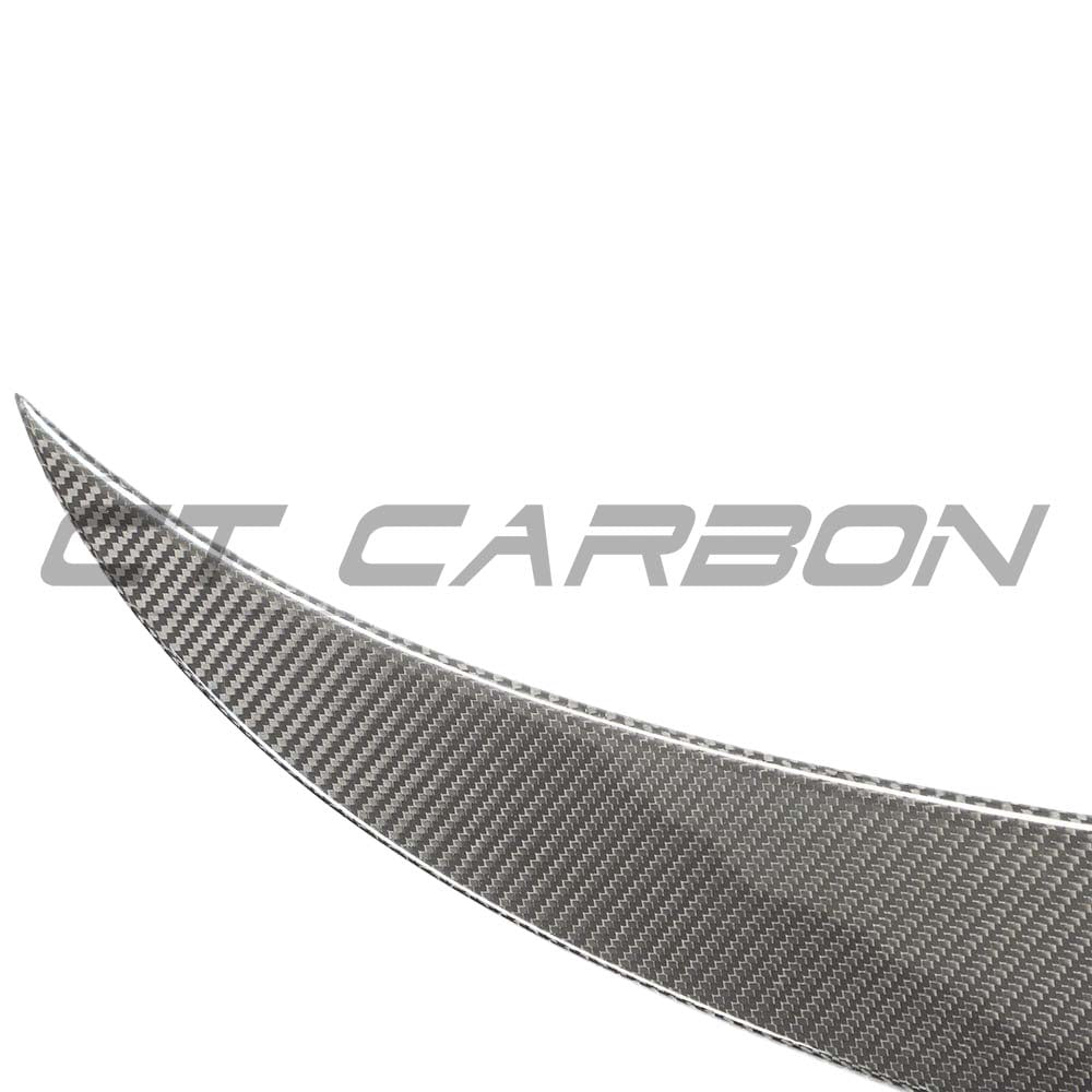 BMW M4 G83 G23 Carbon Fibre Spoiler by CT Carbon, showcasing sleek aerodynamic design on a high-performance car.