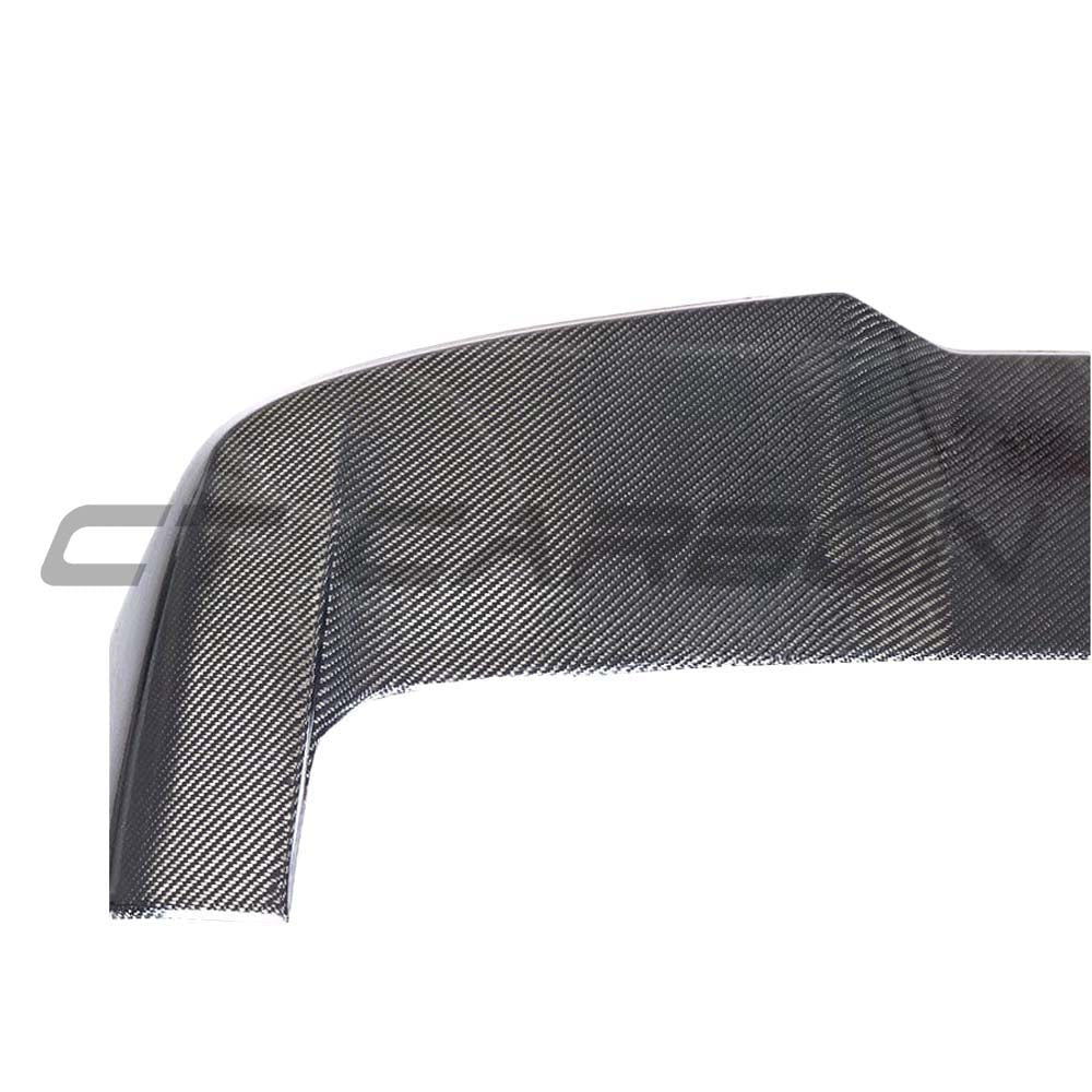 BMW X5 G05 carbon fibre spoiler by CT Carbon, showcasing sleek aerodynamic design and glossy black finish on the car's rear.